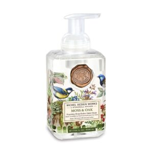 Michel Design Foaming Soap in Moss & Oak, offering a grounding blend of earthy oak, fresh moss, and a touch of woodsy pine. Perfect for gently cleansing your hands while creating a serene, nature-inspired fragrance that evokes the tranquility of a forest retreat.