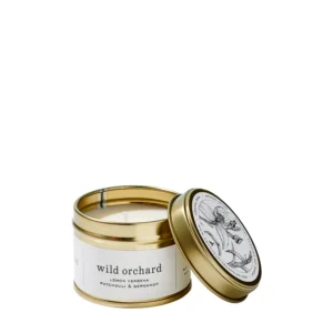 AMANDA + JAYNE Wild Orchard Gold Tin, featuring a vibrant blend of fresh fruits and floral notes. A perfect addition to your home, offering a luxurious, long-lasting fragrance in an elegant gold tin.