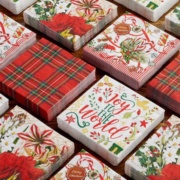 Pack of Michel Design Nutcracker Suite Luncheon Napkins featuring intricate holiday-themed designs with festive colors, perfect for adding a touch of elegance to your holiday table setting